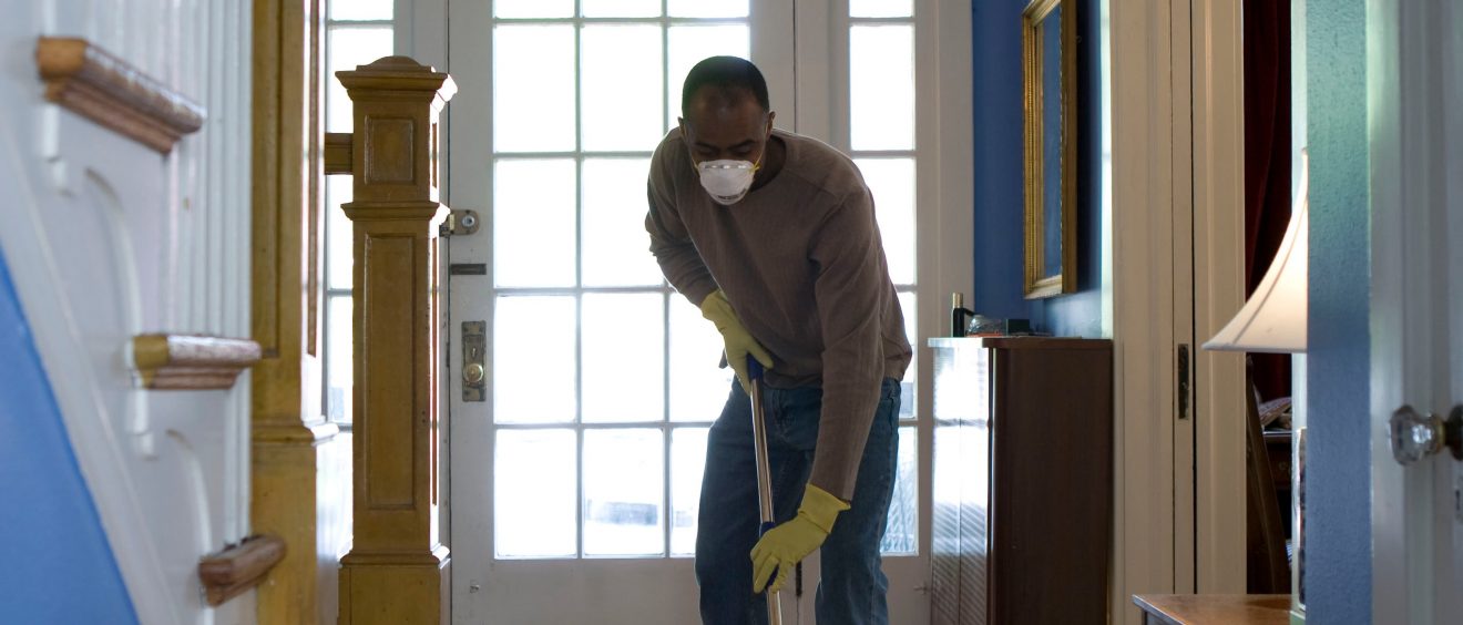 person cleaning floor